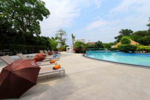 Πισίνα στο ή κοντά στο Coco Beach Hotel Jomtien Pattaya