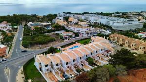 an aerial view of a city with buildings and a street at Casa Galé - Joia das Sesmarias 600mts praia in Albufeira