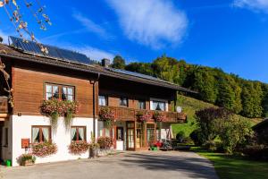 a house with solar panels on the roof at Oberaschenauer-Hof in Ruhpolding