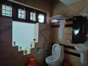Koupelna v ubytování Anandam Stays - Premium 3BHK plush homestay, Vaikom near Kumarakom