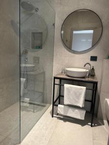 Een badkamer bij Hotel DRAŠ
