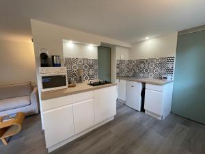 Kuchyň nebo kuchyňský kout v ubytování Appartements Barcelonnette + 5 fotografií