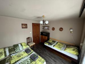 Posteľ alebo postele v izbe v ubytovaní Z&T Apartmanok