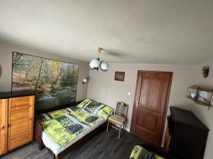 Posteľ alebo postele v izbe v ubytovaní Z&T Apartmanok
