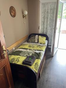 Posteľ alebo postele v izbe v ubytovaní Z&T Apartmanok
