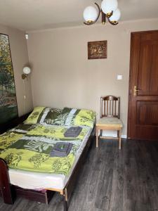 Posteľ alebo postele v izbe v ubytovaní Z&T Apartmanok
