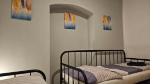 Ein Bett oder Betten in einem Zimmer der Unterkunft APARTMENTS KREMSTAL