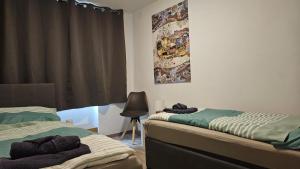 Ein Bett oder Betten in einem Zimmer der Unterkunft APARTMENTS KREMSTAL