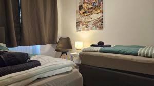 Ein Bett oder Betten in einem Zimmer der Unterkunft APARTMENTS KREMSTAL