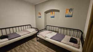 Ein Bett oder Betten in einem Zimmer der Unterkunft APARTMENTS KREMSTAL