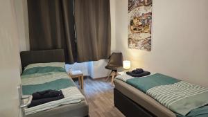 Ein Bett oder Betten in einem Zimmer der Unterkunft APARTMENTS KREMSTAL