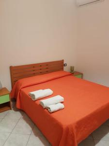 Postel nebo postele na pokoji v ubytování Casa Vacanza, Ristorante Borgorosso