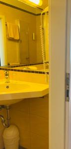 Koupelna v ubytování Hotel Germania
