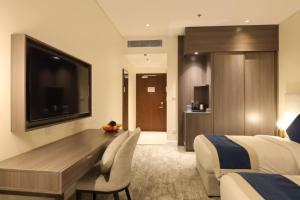 TV o dispositivi per l'intrattenimento presso فندق سافوي جدة Savoye Hotel