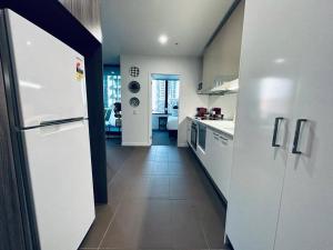 Küche/Küchenzeile in der Unterkunft CBD Apartment - Best Amenities!