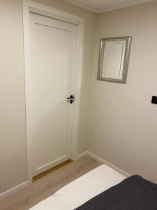 Postel nebo postele na pokoji v ubytování Rom # 2 Appartmenthotell Oslo Adress Isabels vei 16