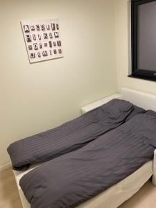 Postel nebo postele na pokoji v ubytování Rom # 2 Appartmenthotell Oslo Adress Isabels vei 16