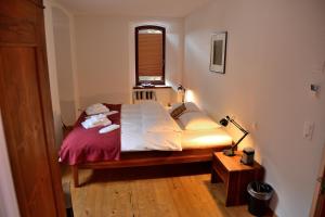 Voodi või voodid majutusasutuse Unique Hotel Fusio toas