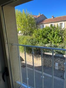 a view from the door of a balcony at Les Cerises du Pont du Gard in Remoulins