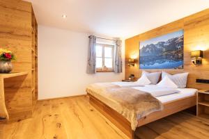 Легло или легла в стая в "Fewo am Dorfplatz" - Annehmlichkeiten von 4-Sterne Familien-und Wellnesshotel Viktoria können mitgenutzt werden