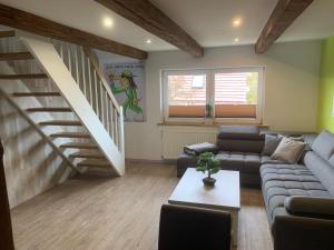 Posezení v ubytování Ferienwohnung Am Graben