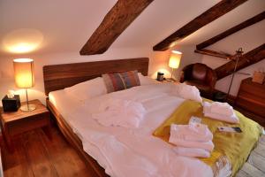Voodi või voodid majutusasutuse Unique Hotel Fusio toas