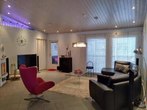 TV a/nebo společenská místnost v ubytování Villa Snowflake