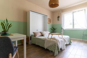 Letto o letti in una camera di Amagi Home