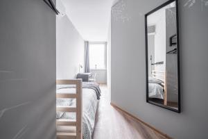 Postel nebo postele na pokoji v ubytování Lollo Motel Graičiūno - Lollo Luxury