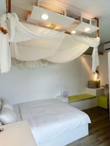 Letto o letti in una camera di White&Light B&B