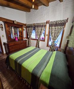 Ein Bett oder Betten in einem Zimmer der Unterkunft Don Polo casaboutique