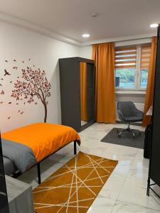 Posezení v ubytování Zimmer Orange mit Weitblick und Sauna