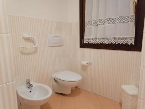 Koupelna v ubytování Agriturismo Il Salice Ridente