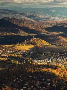 an aerial view of a town in the hills at Ezathouse Devičie in Krupina
