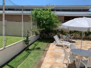 Zahrada ubytování Apartamento 51 proximo a praia da Enseada