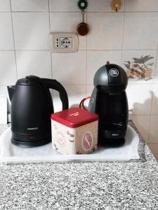 Príslušenstvo na prípravu kávy alebo čaju v ubytovaní Pistoia ROSE Appartamento