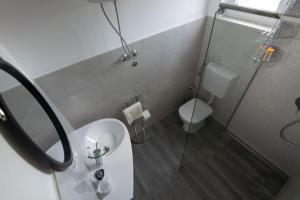 Kúpeľňa v ubytovaní Kuća za odmor M&J