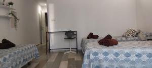 Postel nebo postele na pokoji v ubytování SERRANO Home