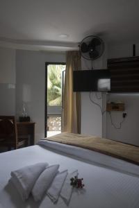 Postel nebo postele na pokoji v ubytování Magni Home + 24 fotografií