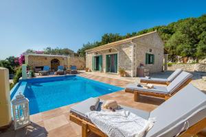 an image of a villa with a swimming pool at Lilac Lilium Artistsvillas in Gaios