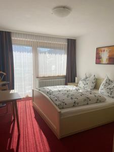 Postel nebo postele na pokoji v ubytování Ferienwohnung Jeller