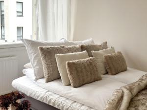 Postel nebo postele na pokoji v ubytování Aurora Central Suite I
