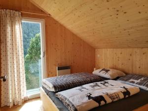 Postel nebo postele na pokoji v ubytování PAAL 162 - Tolle Aussicht, 2 Terasssen, Großes Grundstück