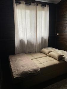 Vilarejo Hospedagem客房内的一张或多张床位