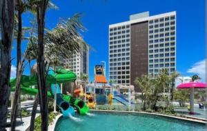 a pool with a water slide in a resort at Salinas Premium Resort in Salinópolis