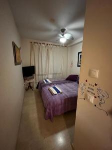Posteľ alebo postele v izbe v ubytovaní Ideal Apartamento Manilva Playa