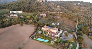 an aerial view of a house and a hotel at Saturnia Tuscany Country House in Saturnia