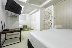 Katil atau katil-katil dalam bilik di Gastelbondo 3 habt Centro Histórico- Plaza Santo Domingo