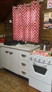 Virtuvė arba virtuvėlė apgyvendinimo įstaigoje Cabanas Route 66