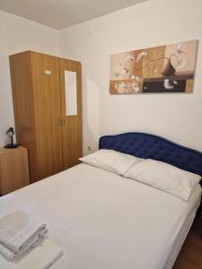 Ein Bett oder Betten in einem Zimmer der Unterkunft Villa Roing S